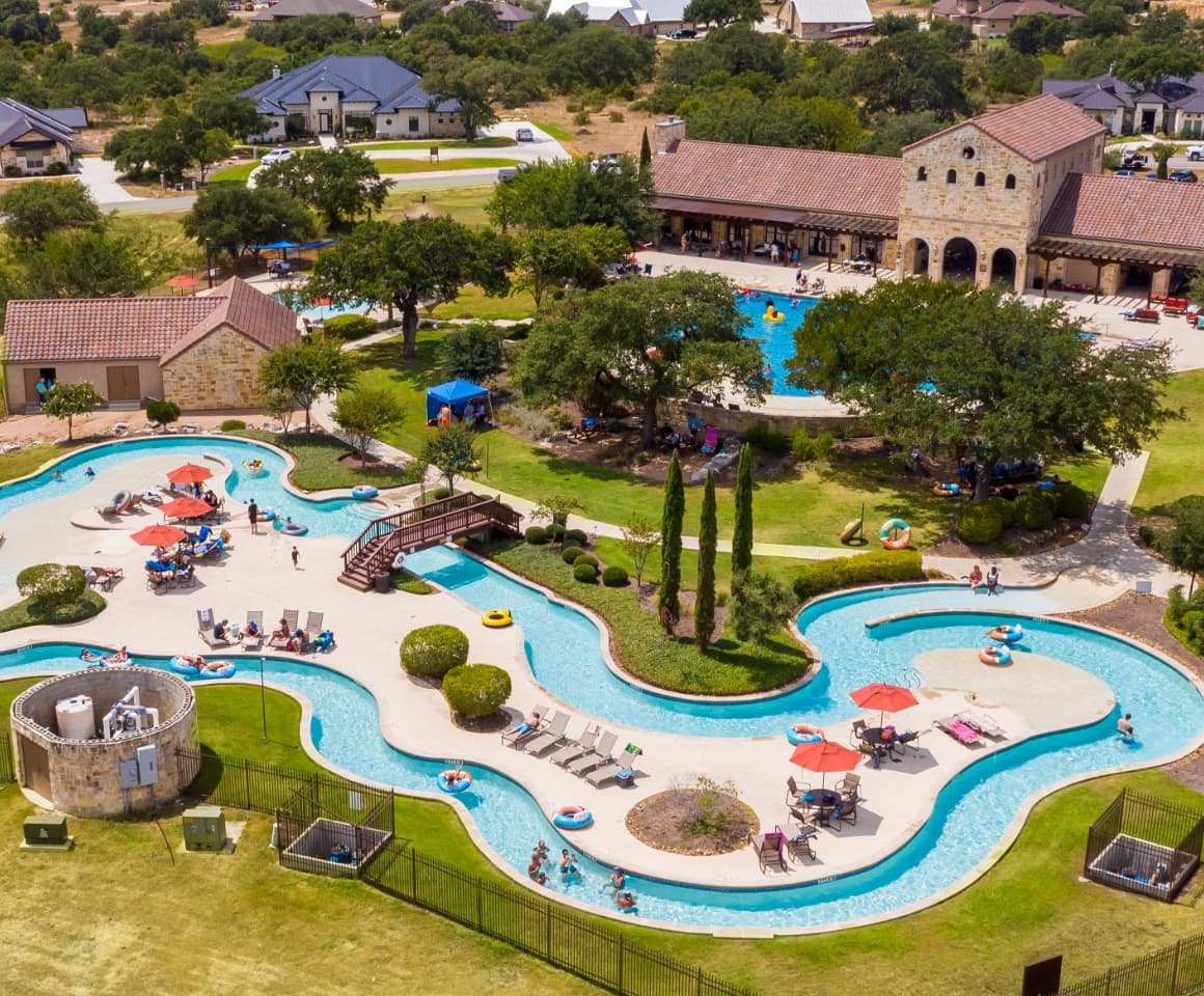 An aerial view of a lazy river pool at a South Star community in san antonio, texas.