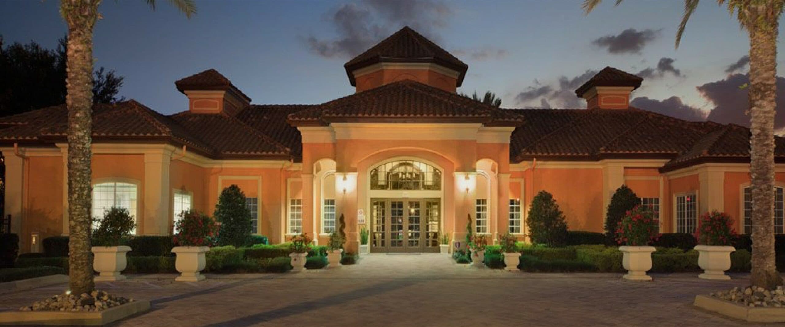 The entrance to the Metro West clubhouse at dusk.