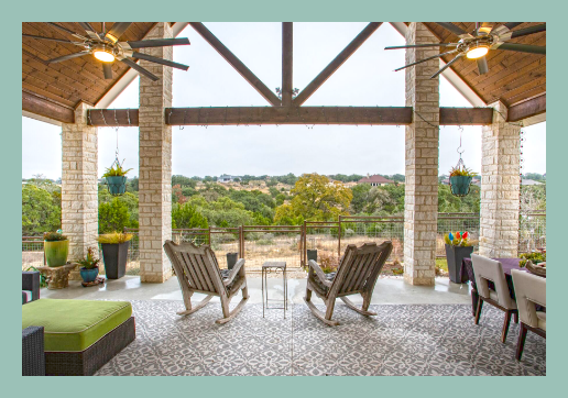 A covered patio with furniture and a ceiling fan in Vintage Oaks