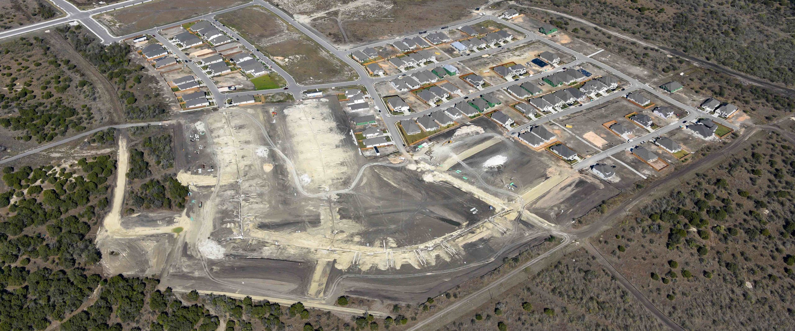 Newly built homes from an aerial perspective in New Braunfels, Texas.